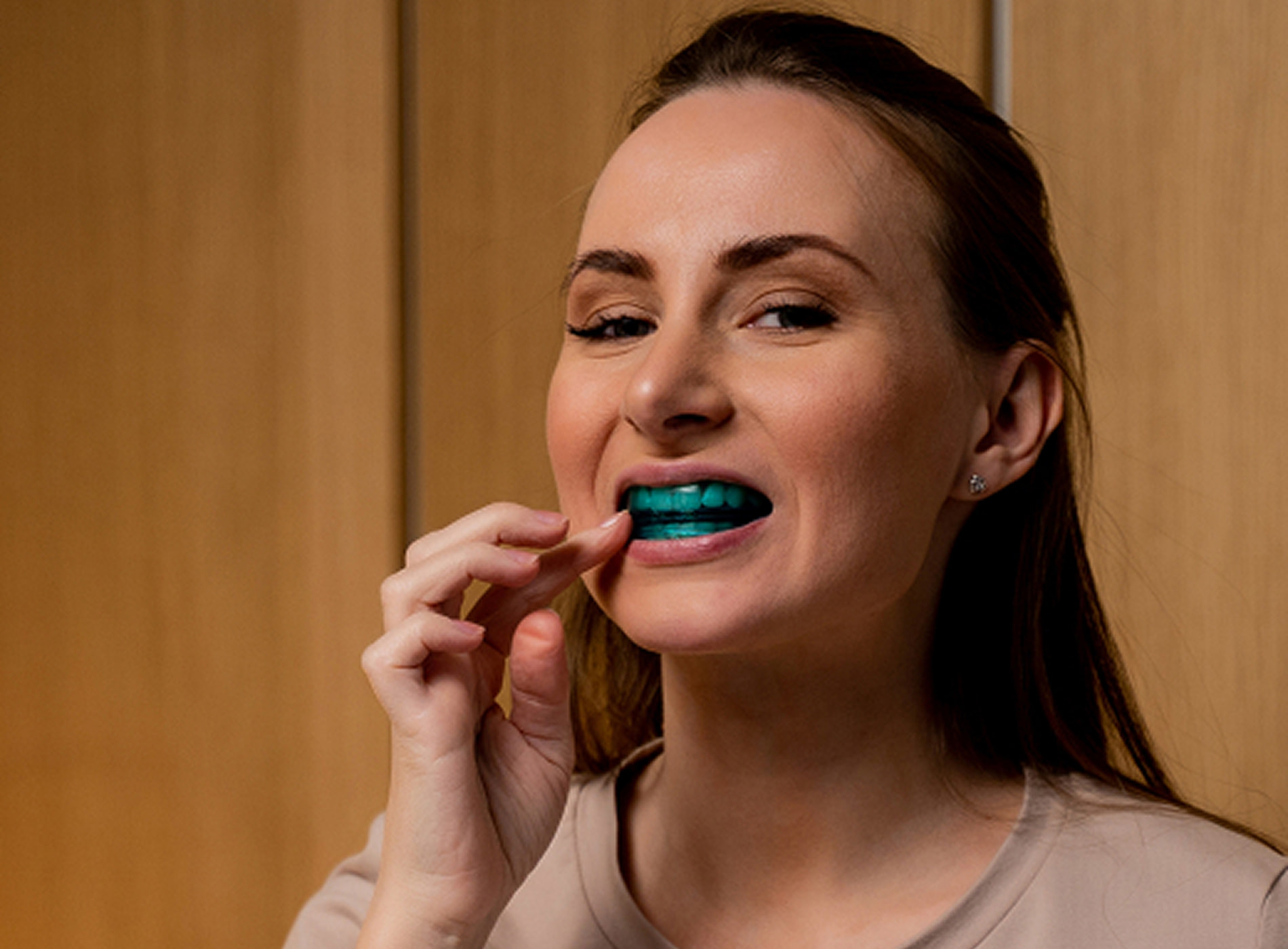 Custom night guards protect teeth and jaw from nighttime grinding and clenching.